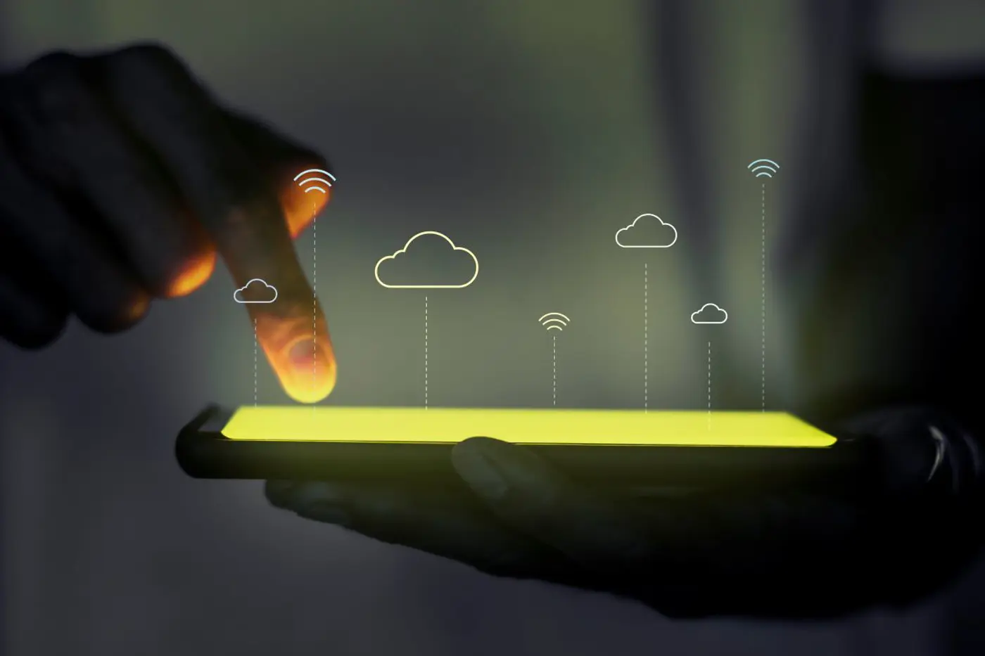 Glowing screen with cloud icons above