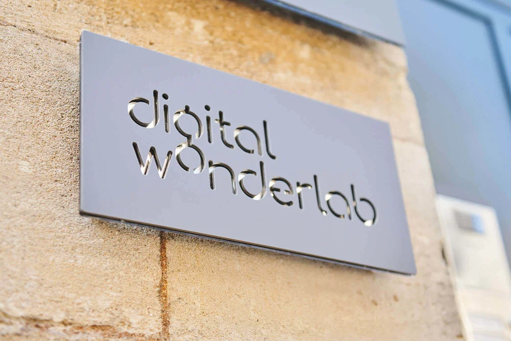 Digital Wonderlab sign on the wall at the front door