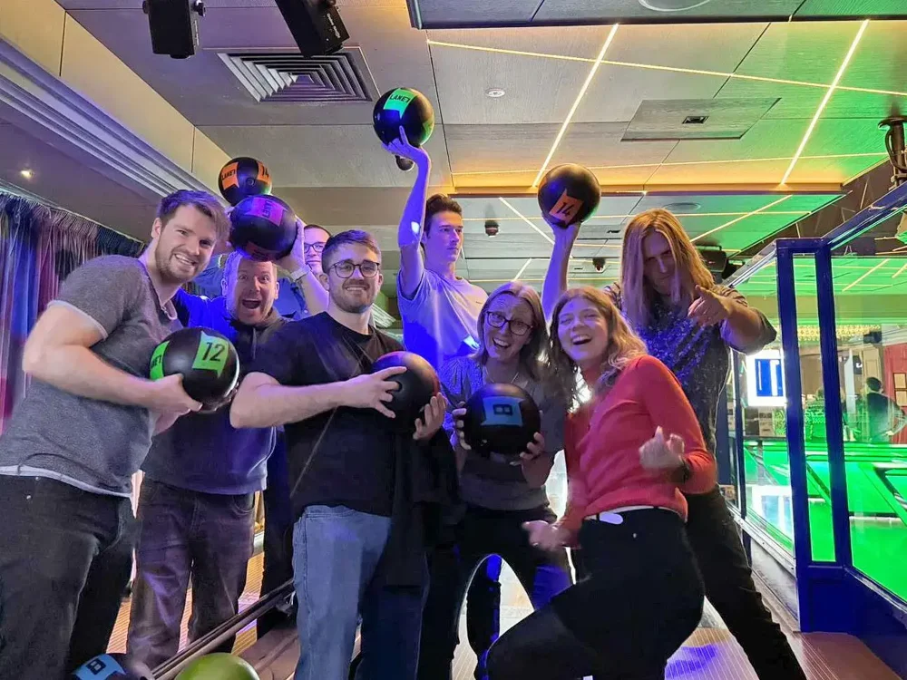 Digital Wonderlab team celebrating at bowling 