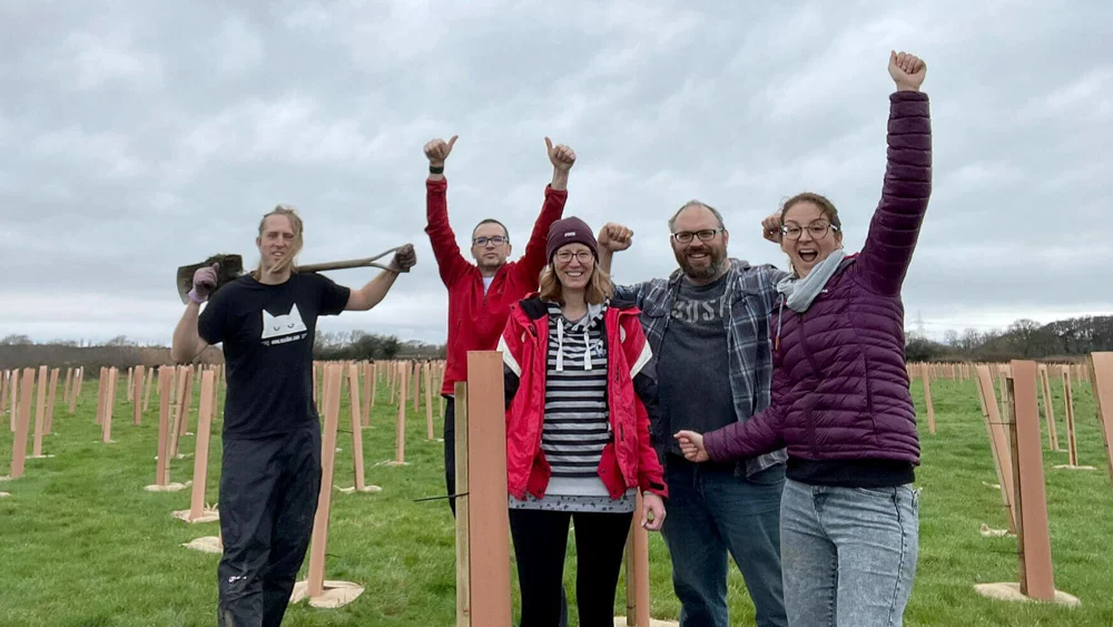 Darren McGrath, Nathan Baranowski, Rachel Passmore, Tom Passmore and Kim Hannon cheering from finishing their tree planting