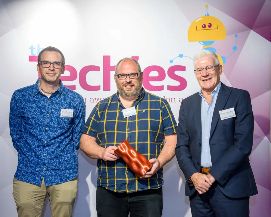 Nathan and Tom holding best User Experience award at Techies awards