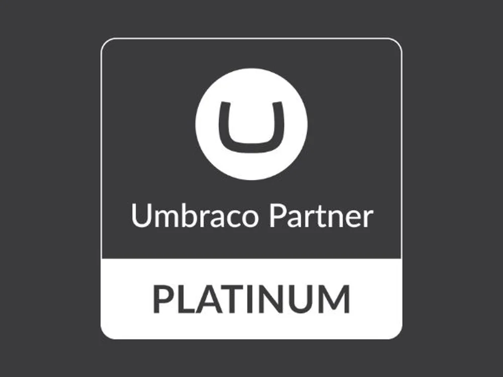 Umbraco Platinum Partner logo on dark gray