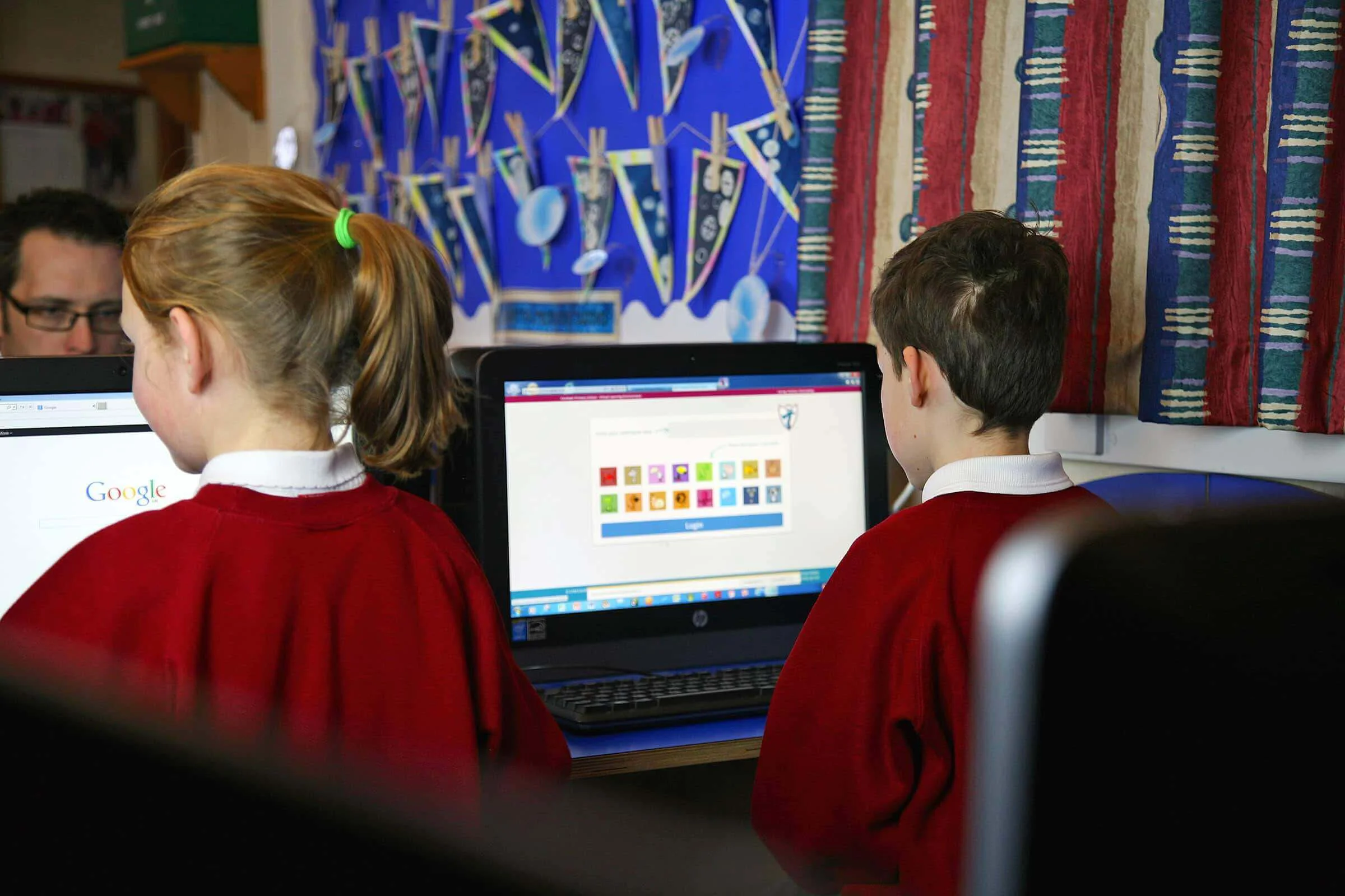 School children using Blue turtle VLE on computers