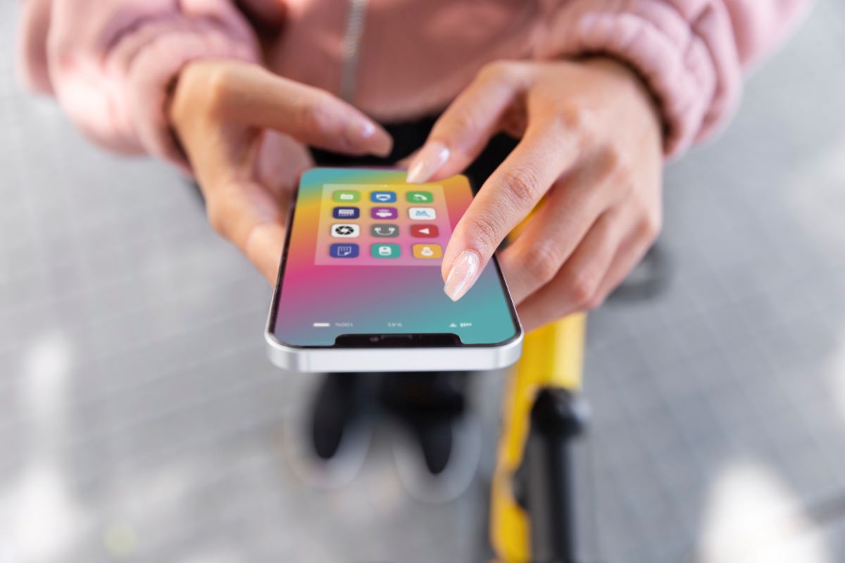 Ios Vs Andriod App Development woman using mobile