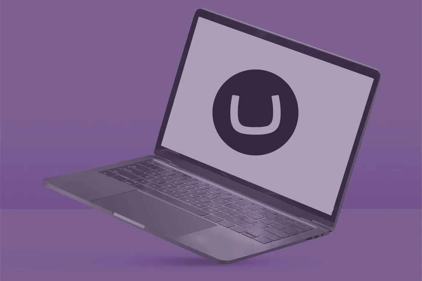Laptop with Umbraco logo on screen