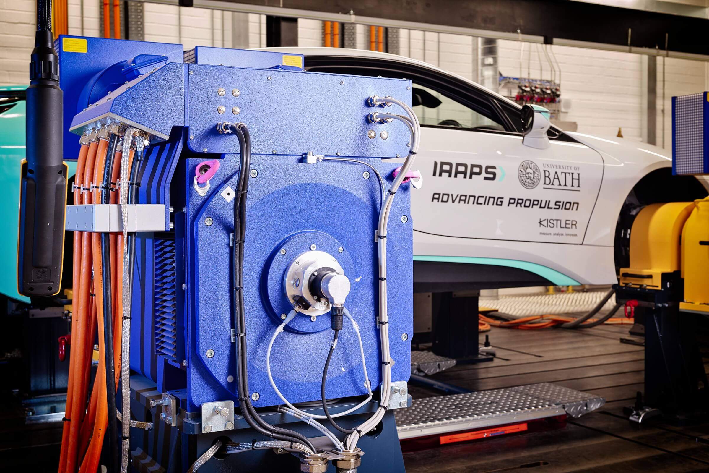 IAAP's cell machine with a car in the background