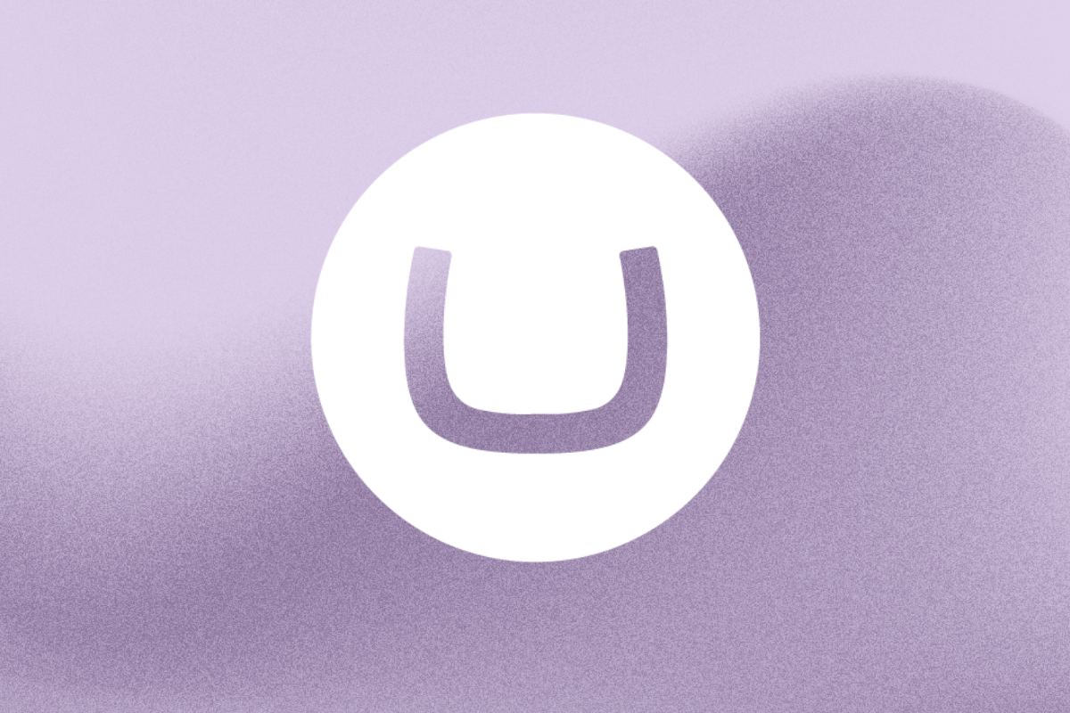 Umbraco logo on textured purple background Umbraco logo on textured purple background